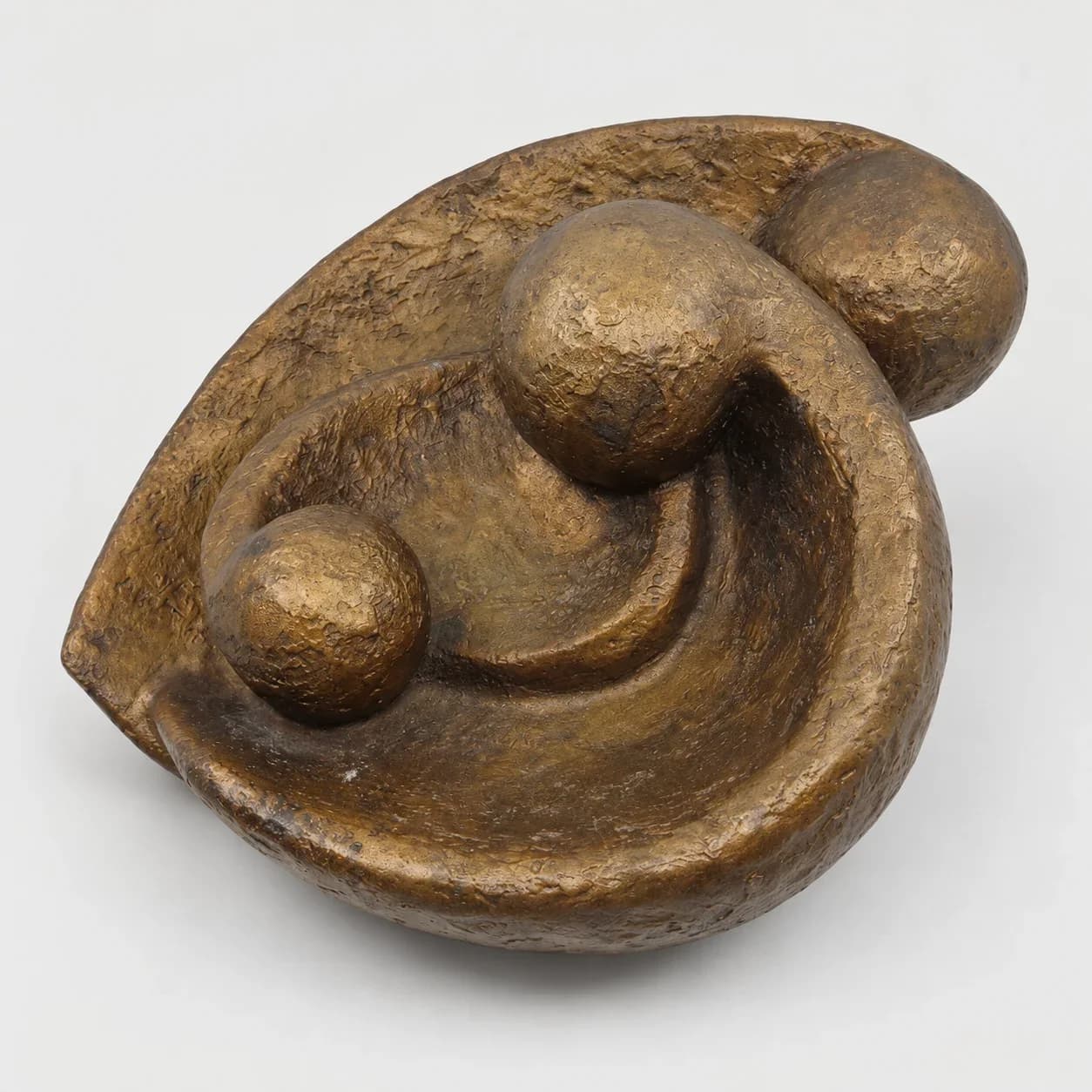 Sculpture abstraite en bronze patiné